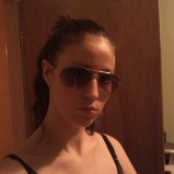 Attitude with sunglasses, hair tied - 2011 (Image of Celinka Serre)